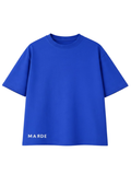 Blue t-shirt with 'MADRE' branding on a white background